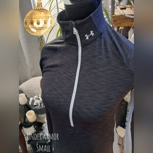 Ladies Under Armor half zip Pullover size small.  Dark Gray and white